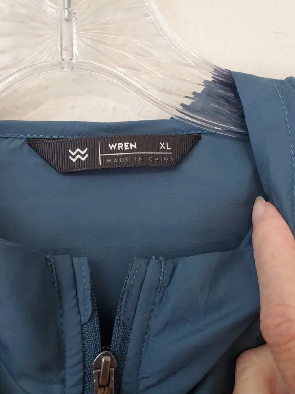 Wren men's 1/2 zip packable pullover windbreaker in Pacific Blue